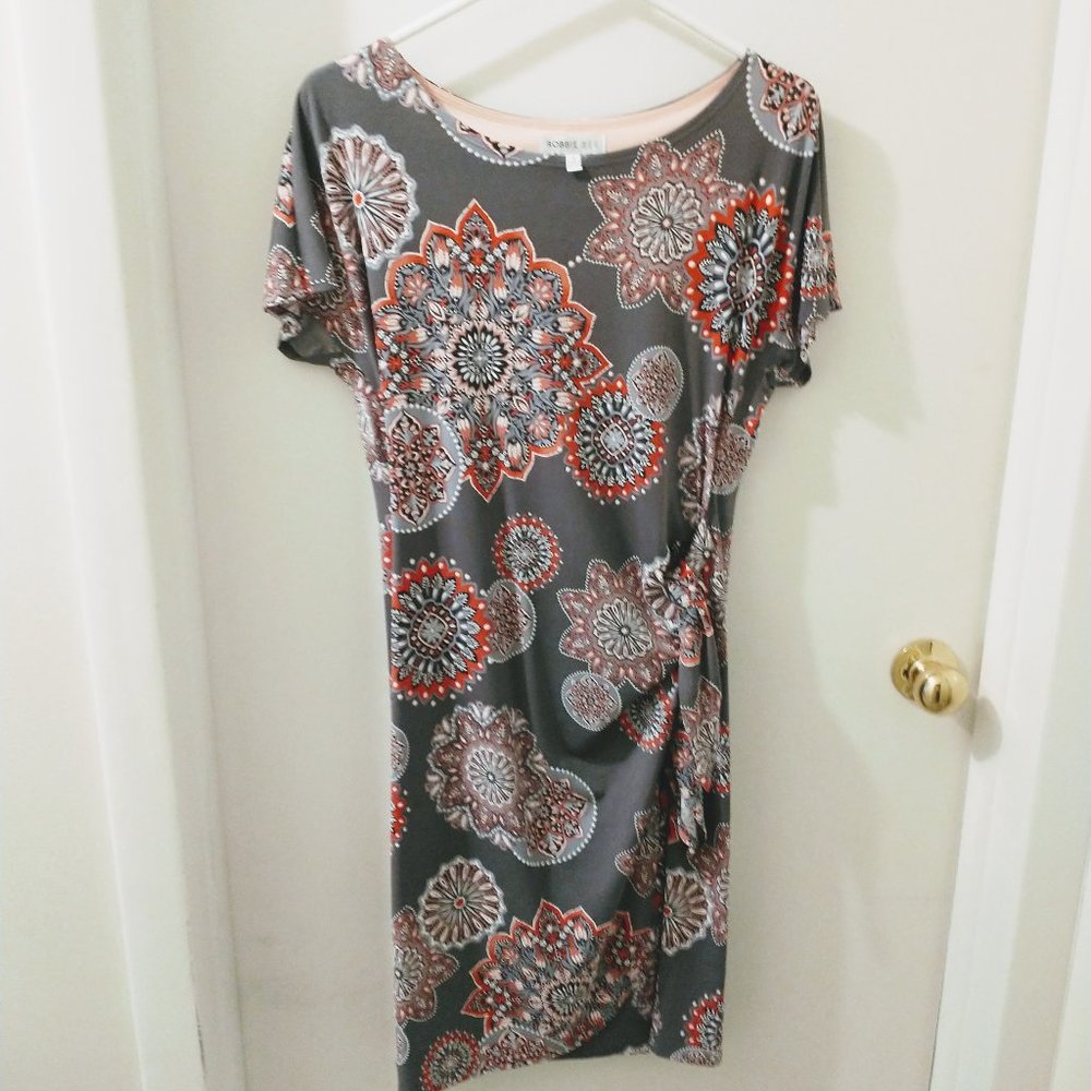 Stunning on accentuate s the waist  medallion dress